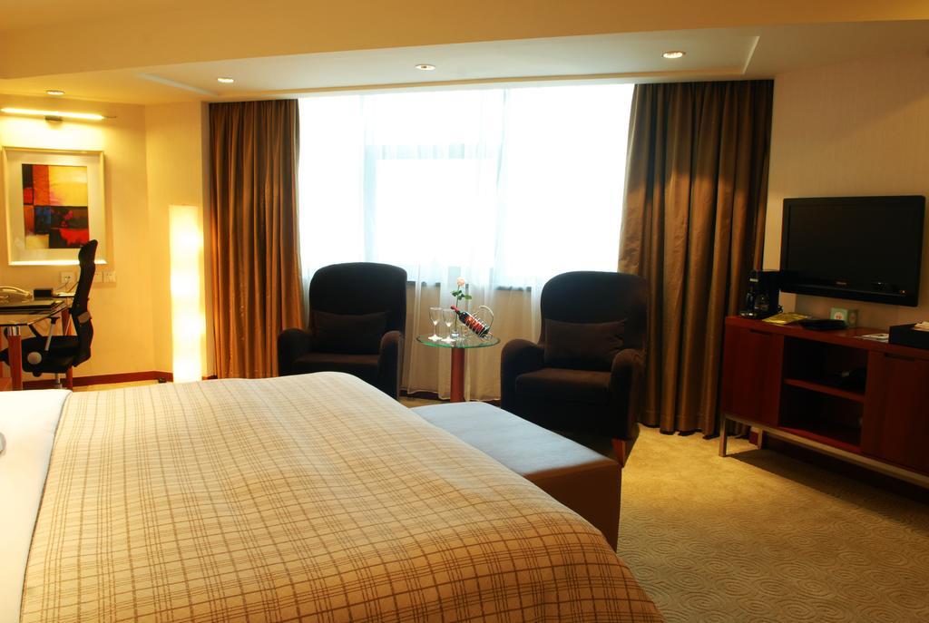 Merryland Traders Hotel Changshu Room photo